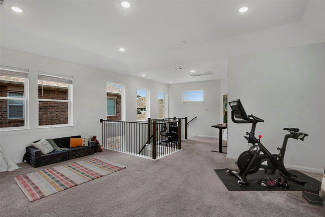 Exercise room featuring recessed lighting, baseboards, and carpet | Image 20