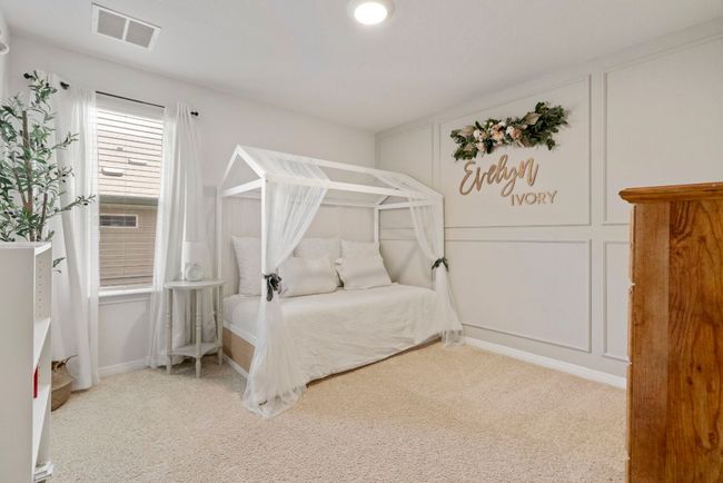Bedroom with carpet | Image 18
