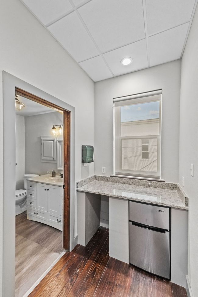 Unfurnished room with carpet flooring, recessed lighting, and a drop ceiling | Image 9