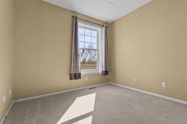 Bedroom #2 on main level would make a great office or craft room. New window installed 2024. | Image 14