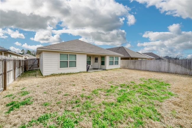 Back of property featuring a yard | Image 35