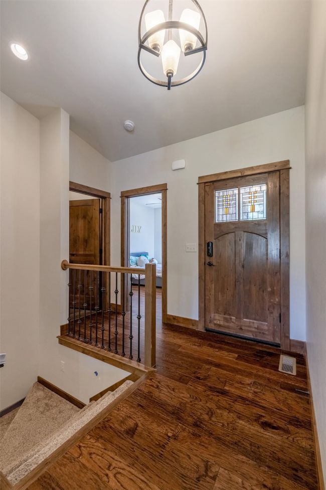 Foyer entrance with wood finished floors, baseboards, and recessed lighting | Image 29