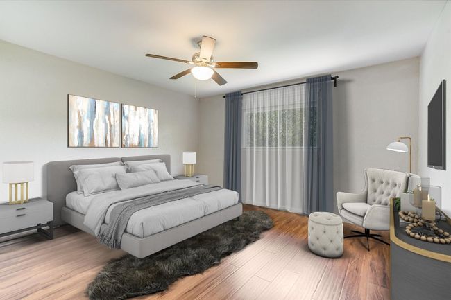 Bedroom featuring wood finished floors and a ceiling fan | Image 6