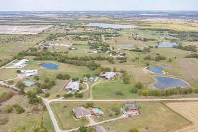 Bird's eye view featuring a rural view and a water view | Image 1