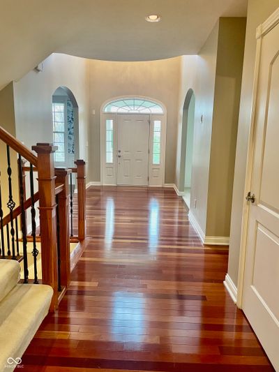 Inviting entry has the dining room to the right and and the formal living room to the left. | Image 2