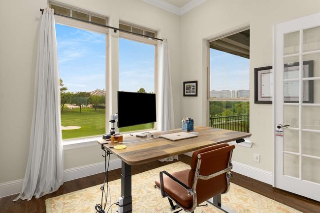 Office space featuring plenty of natural light, and fantastic view of golf course. | Image 28