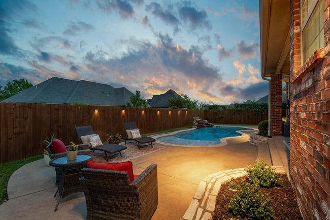 Additional patio area in the spacious backyard. | Image 32