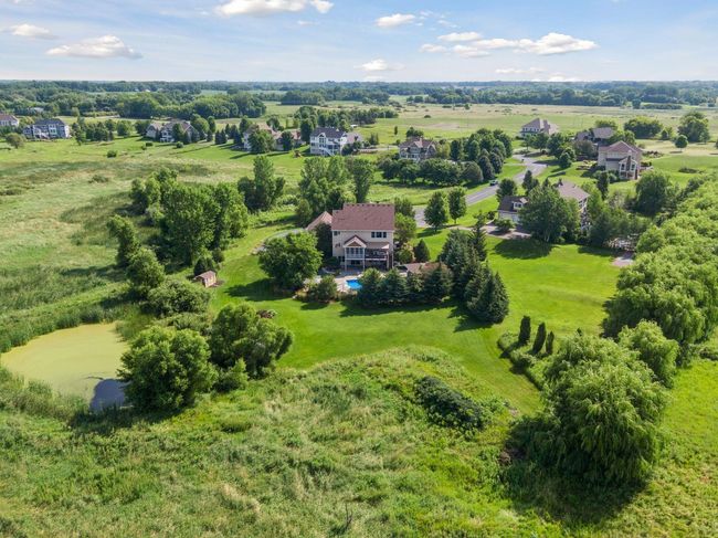 Home is tucked into the neighborhood and located at the end of a cul de sac providing the best of both worlds - privacy and neighbors to borrow a cup of sugar from. | Image 86
