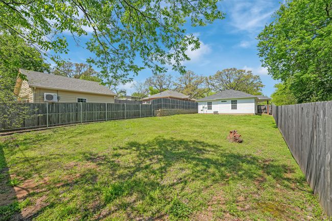 View of yard featuring a fenced backyard | Image 34