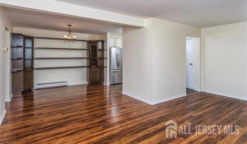 703 Cricket Ln, Woodbridge, NJ, 07095-1552 | Card Image