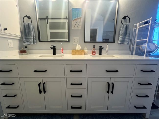 Bathroom featuring double vanity | Image 35