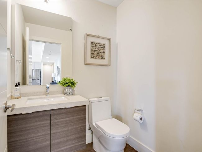 Half bath with toilet and vanity | Image 18