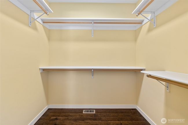 Ample walk-in closet offers plenty of room for clothes and accessories. | Image 17