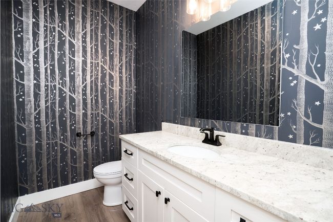 Half Bath located in-between kitchen and mudroom/laundry - Main Level | Image 27
