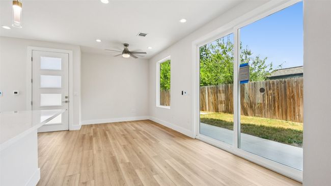 Doorway to outside featuring recessed lighting, wood finished floors, and a ceiling fan | Image 14