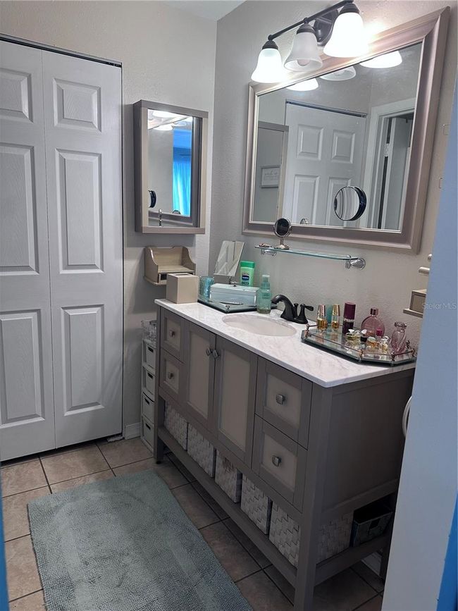 primary bath to master large walk in closet | Image 25