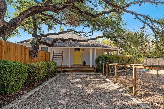 View of front of house featuring a fenced front yard and covered porch | Image 5