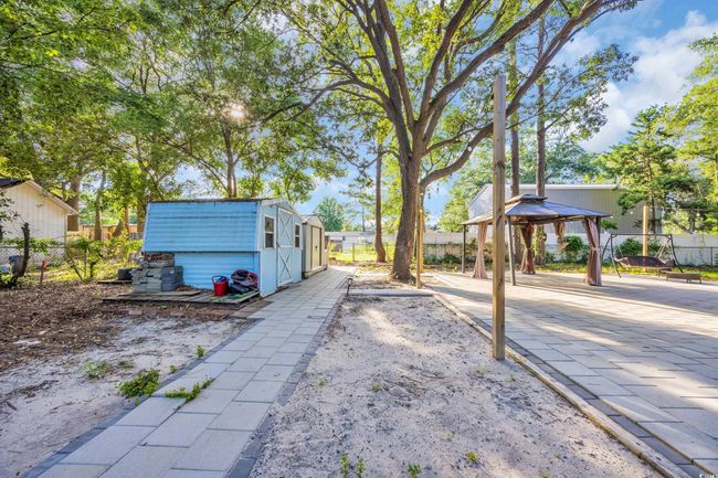 View of yard featuring a gazebo | Image 23