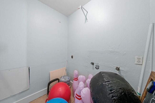 Laundry room/storage. | Image 20