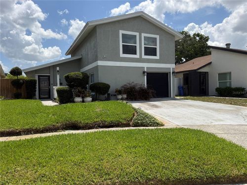 10009 Regal Woods Lane, TAMPA, FL, 33624 | Card Image