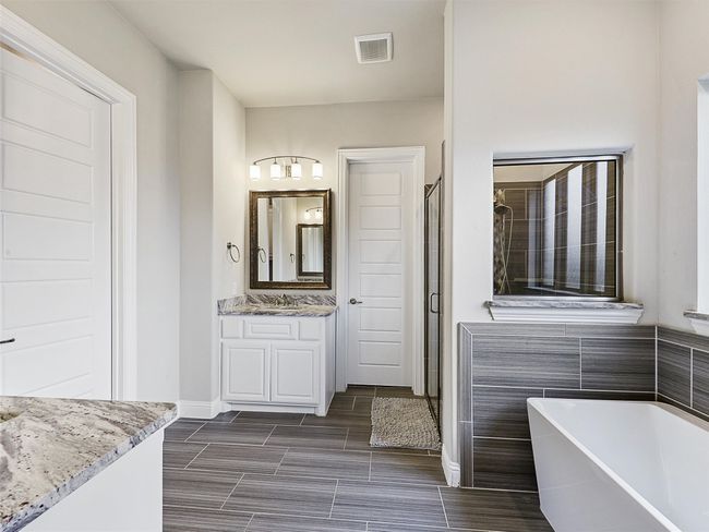 Spacious Master bathroom with separate shower | Image 17