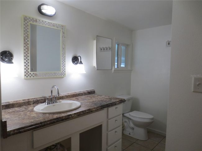 Sit down tiled shower | Image 58