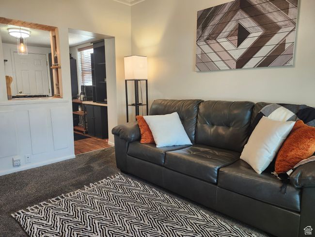 View of carpeted living area | Image 12