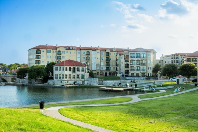 View of community featuring a water view and a yard | Image 5
