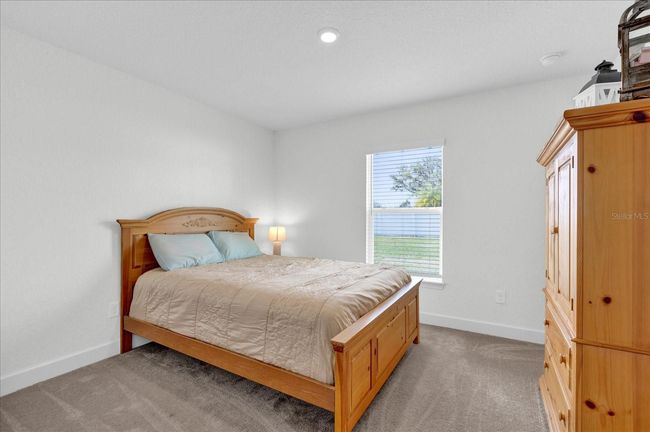 9750 Pepper Tree Pl, House other with 4 bedrooms, 2 bathrooms and null parking in WILDWOOD FL | Image 23