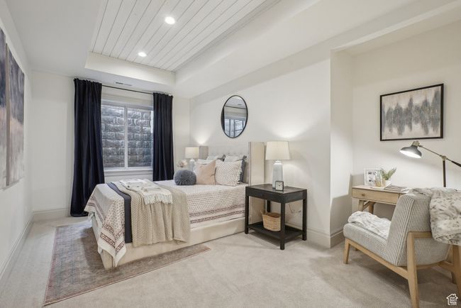 Bedroom with light carpet, recessed lighting, a raised ceiling, and baseboards | Image 50