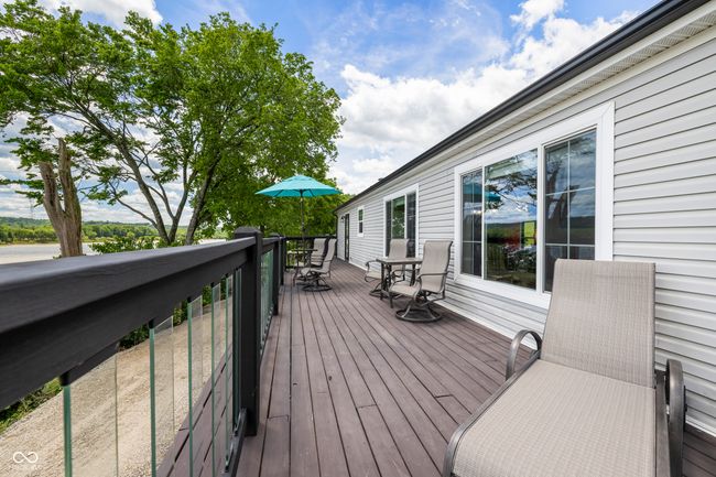 wooden deck with outdoor dining space | Image 45