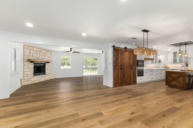 Spacious open-concept living and dining area, perfect for entertaining. | Image 17