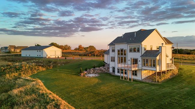 Backyard slab is wired for a hot tub adding to the convenience and enjoyment of this exceptional 10-acre property in Minnetrista. | Image 30