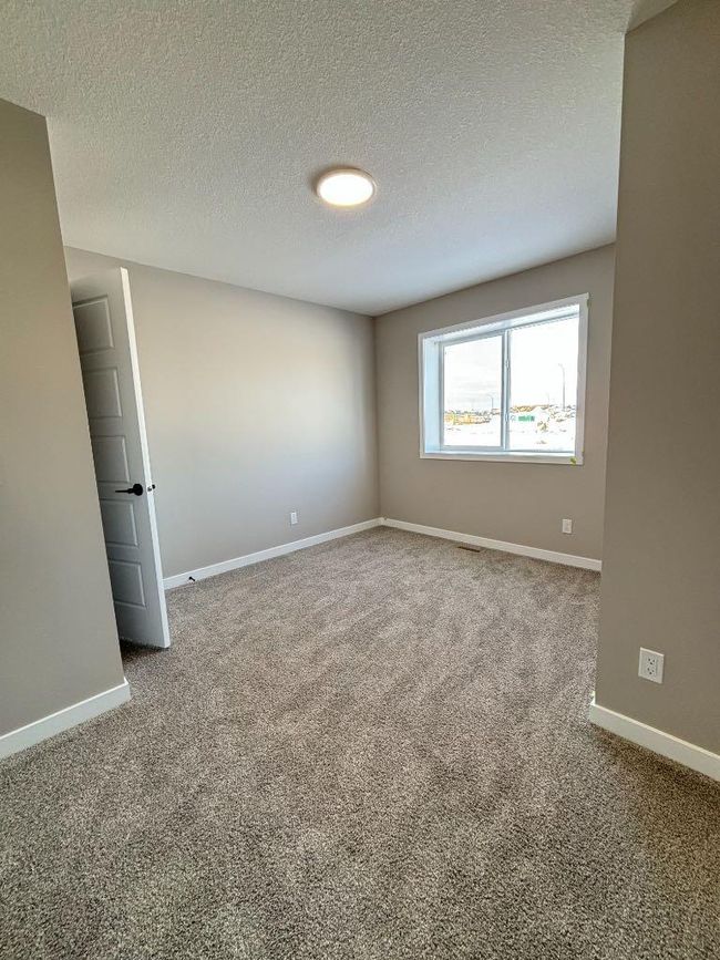 821 Reynolds Manor Sw, Home with 3 bedrooms, 3 bathrooms and 3 parking in Airdrie AB | Image 20