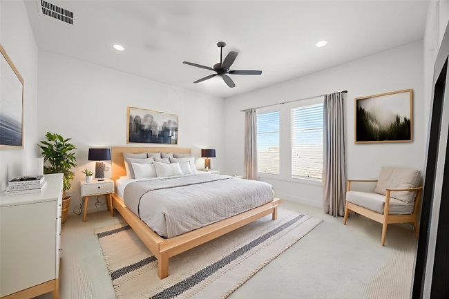 Virtually staged. Carpeted bedroom featuring recessed lighting and a ceiling fan | Image 21