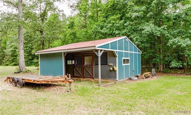 View of pole building with a yard | Image 43