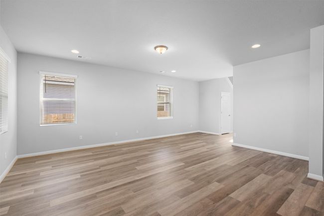 Unfurnished room with light wood-style floors and recessed lighting | Image 6