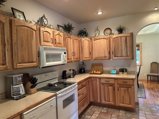 Hickory Cabinets, Tile flooring Convenient work space! | Image 11
