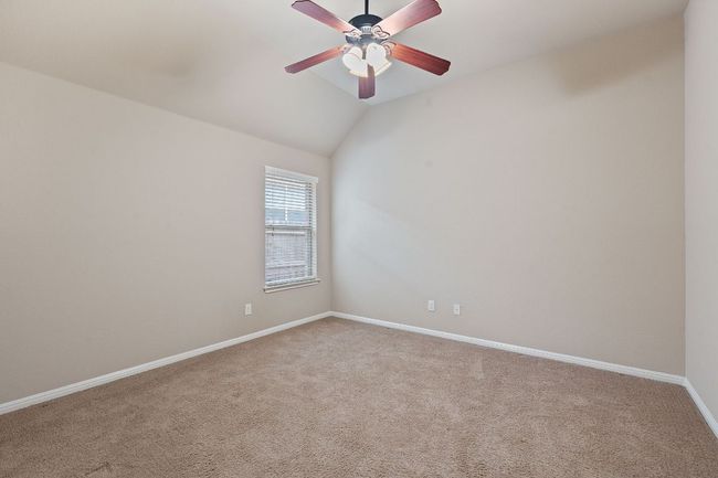 Bedroom 4 room with carpet, a ceiling fan, baseboards | Image 18