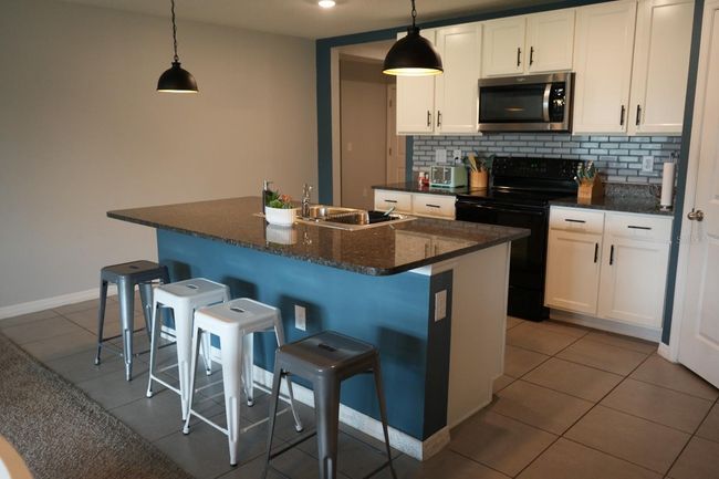 7938 Broad Pointe Dr, House other with 4 bedrooms, 2 bathrooms and null parking in ZEPHYRHILLS FL | Image 11