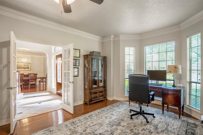 French doors lead to the study / work from home office area (which is versatile and could by used as a flex space). | Image 8