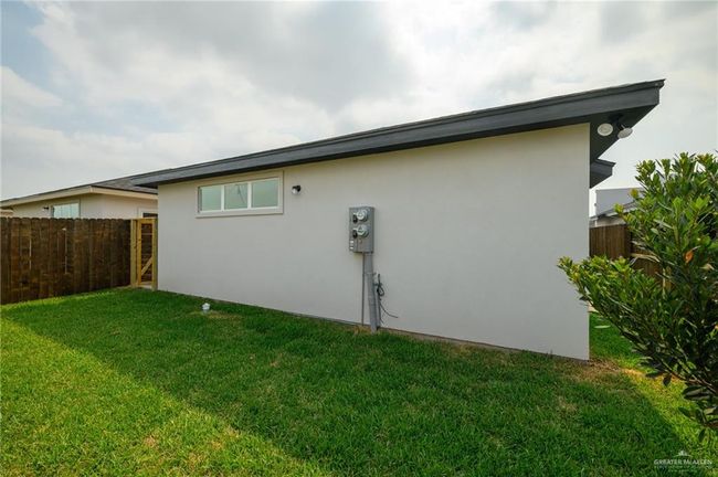 View of home's exterior featuring stucco siding | Image 24