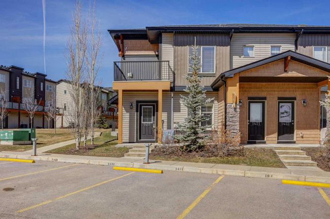 1411 - 2461 Baysprings Link Sw, Home with 2 bedrooms, 1 bathrooms and 1 parking in Airdrie AB | Image 1