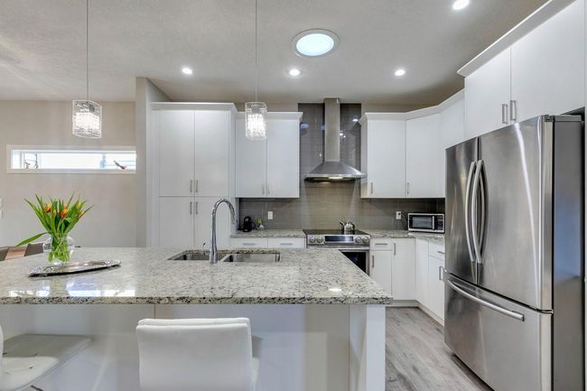 8 Drake Landing Street, House other with 3 bedrooms, 3 bathrooms and 4 parking in Okotoks AB | Image 6