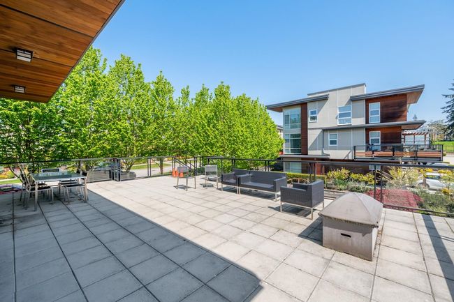 View of patio featuring an outdoor hangout area and outdoor dining space | Image 27