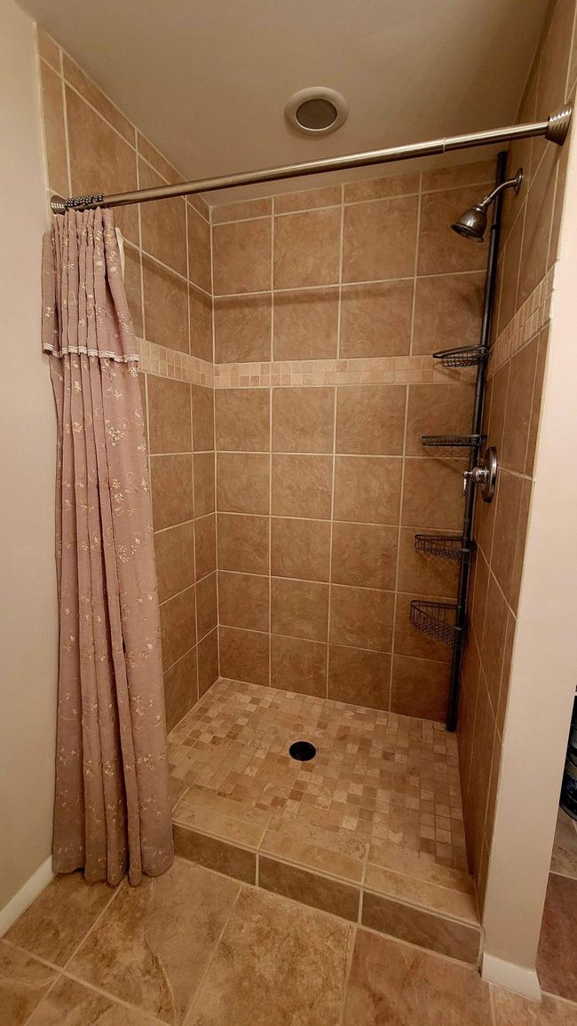 Ceramic tiled shower in lower level | Image 19