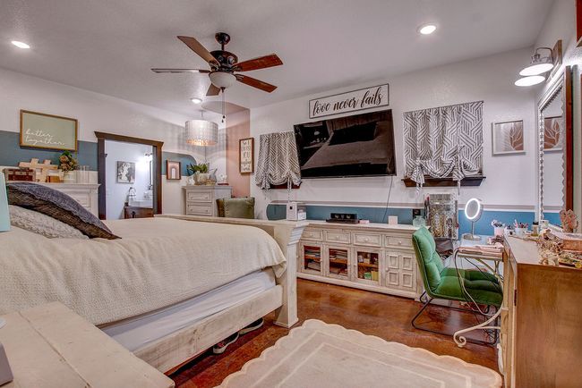 Bedroom featuring a ceiling fan and recessed lighting | Image 14