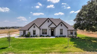 View of front facade featuring a front yard and a rural view | Image 2