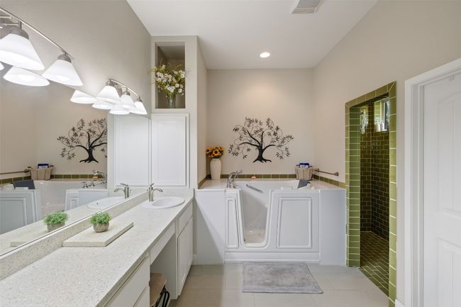 Full bath with tile patterned floors, visible vents, tiled shower, and a garden tub | Image 13