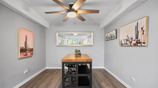 Dining area- neutral painted walls accentuate the space | Image 15
